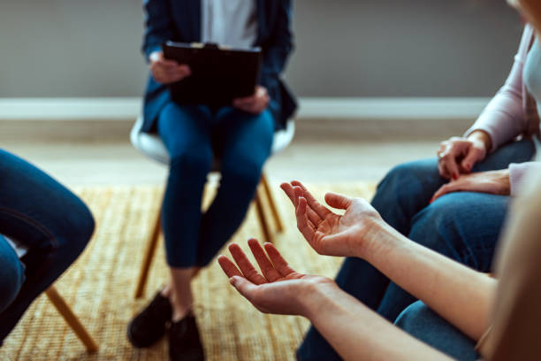 istock Group of business people having a discussion 1386881835