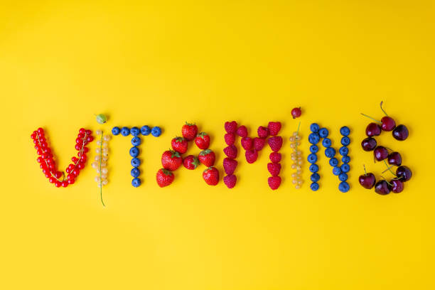 istock The word Vitamins made of different fresh summer berries 1386882766