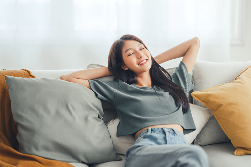 https://media.istockphoto.com/id/1386882772/photo/relaxed-young-asian-woman-enjoying-rest-on-comfortable-sofa-at-home-calm-attractive-girl.jpg?b=1&s=170667a&w=0&k=20&c=R6tP7gcnpn3HpOwAZXOhrdT_H8HGGu16ukFE-6QIAbg=