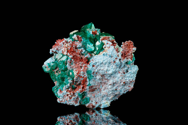 istock macro mineral stone Dioptase on a black background 1386886778