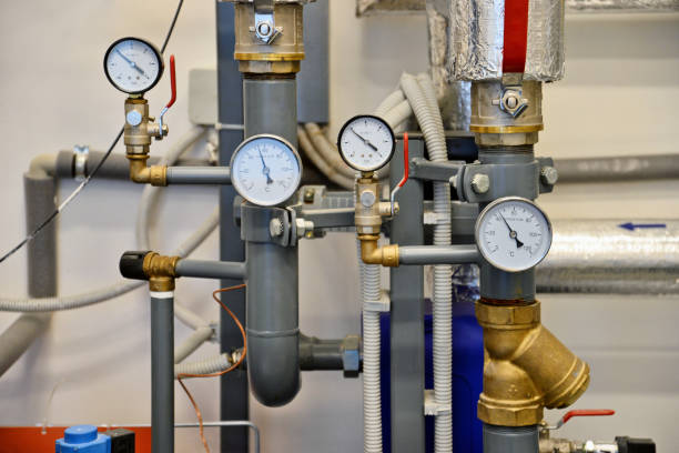 istock Heating system in the house. Pipeline and termometeres 1386888424
