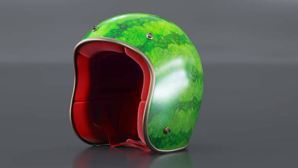 istock helmet as water-melon isolated on dark background, 1386890128
