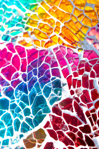 istock Rainbow Vibrant Coloured Shattered Glasss Mosaic Background 1386892853