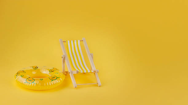 istock Beach chair and funny swimming ring 1386892892