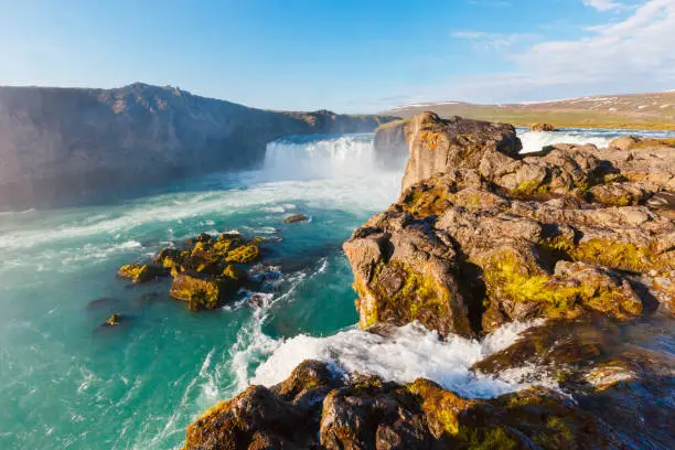 Photo of Scenic image of Godafoss cascade. Location Skjalfandafljot river, Iceland, Europe.