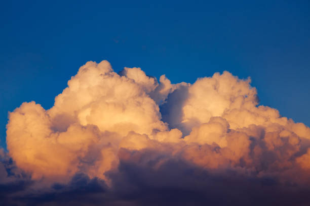 istock Great view of fluffy clouds before storm. Dark ominous clouds. 1386894026
