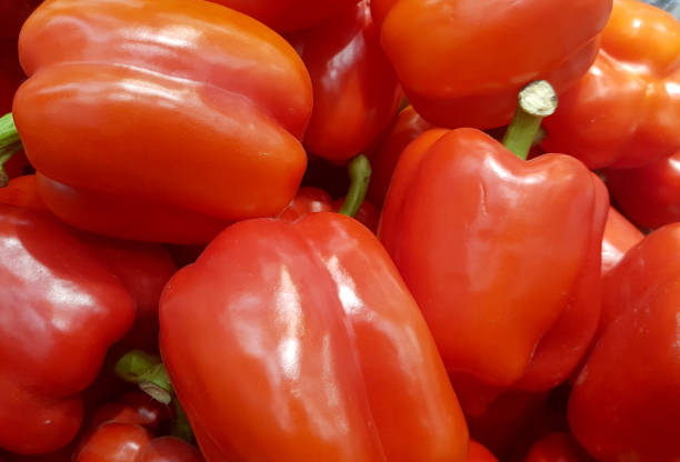 Food background of fresh red sweet pepper close-up, organic vegetable concept stock photo