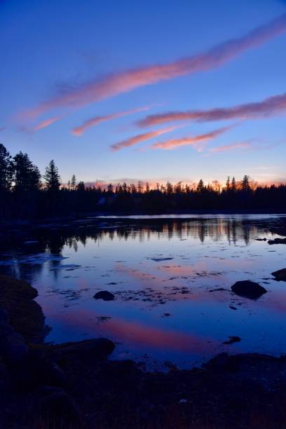 istock Sunset over frozen inlet 1386896982