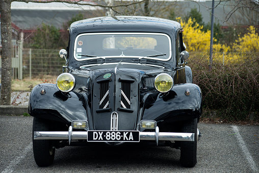 Mulhouse - France - 13 March 2022 - Front view of black Citroen traction parked in the street
