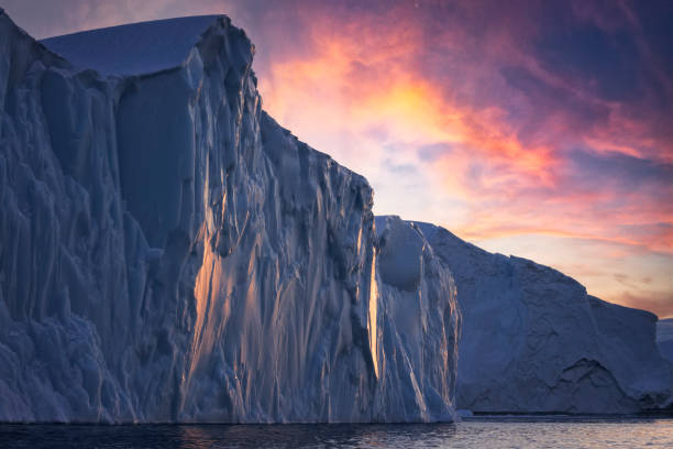 Big icebergs floating over sea in artic polar circle