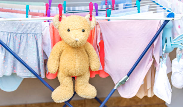 istock Soft toy bear dries after washing. 1386900713
