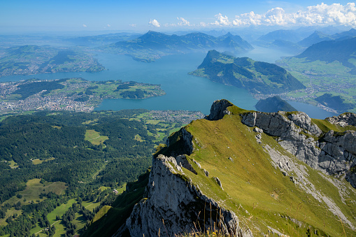 View of Lake Lucerne on a sunny day with clouds in the sky