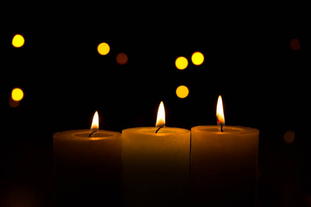 istock Warm candlelight on a dark mysterious background 1386905482