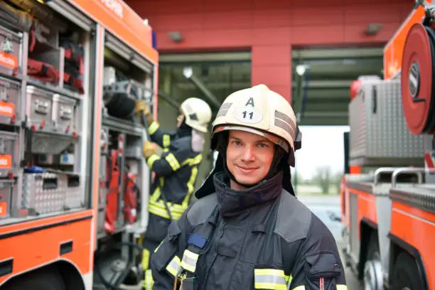portrait of a firefighter in the operations centre at the fire-fighting vehicle