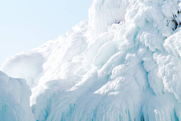 Icy rock on Lake Baikal on a sunny day in Irkutsk, Irkutsk Oblast, Russia