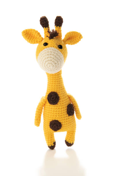 Amigurumi crochet giraffe isolated on white background