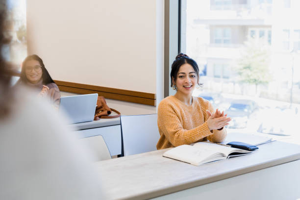 istock Excited young woman cheers 1386910469