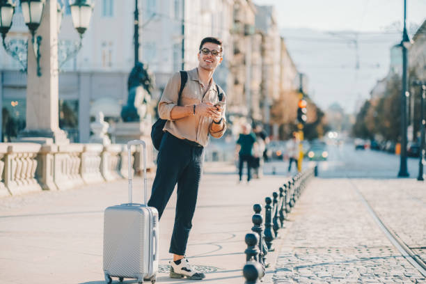 istock Tourist hailing a taxi 1386912230