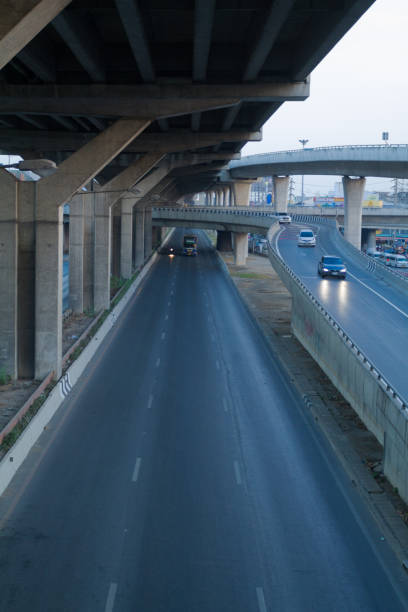 Multi lane road and elevated motorway in Bangkok north in area of Rangsit near Future Park