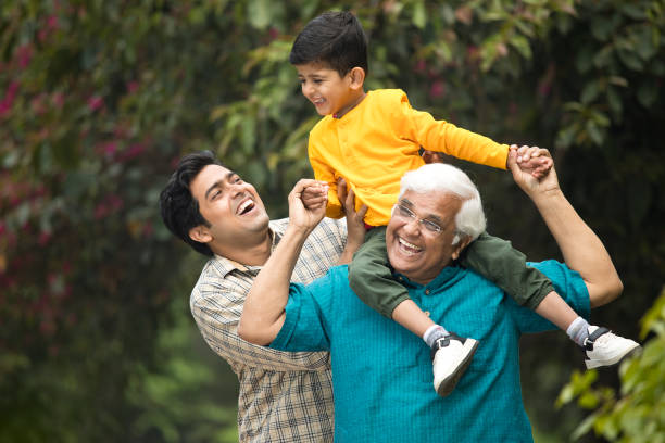 istock Three generation family having fun at park 1386915028