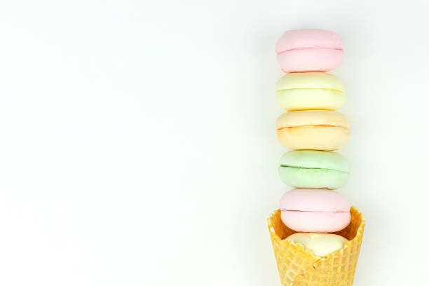 istock Marshmallow looks like macaroons in the horn as ice cream on white background. 1386917873