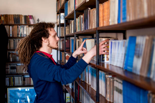 istock Student in the library stock photo 1386922263