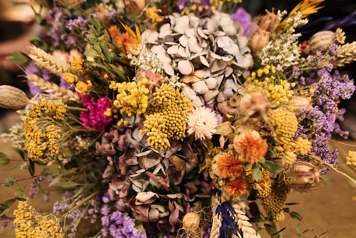 A beautiful, colorful bouquet made with dried flowers