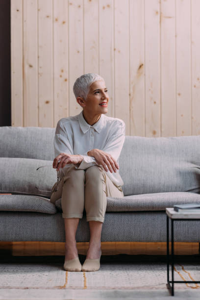 istock A Beautiful Elegant Senior Woman Looking Away While Relaxing At Home 1386923765