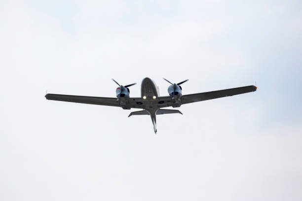 istock twin-engine light aircraft flying in the sky 1386923998