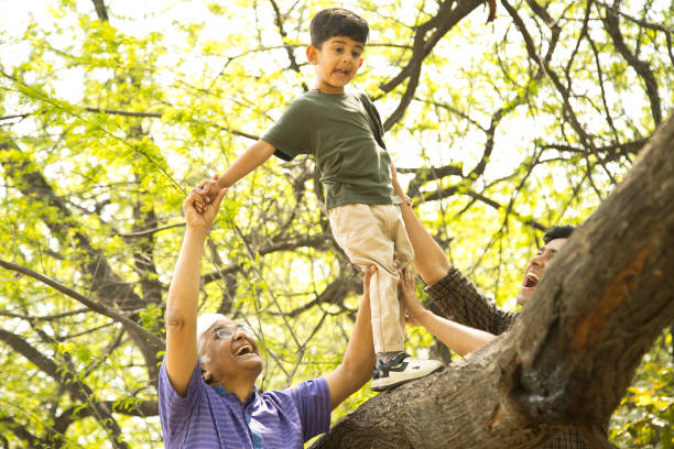 istock Three generation family having fun at park 1386926183