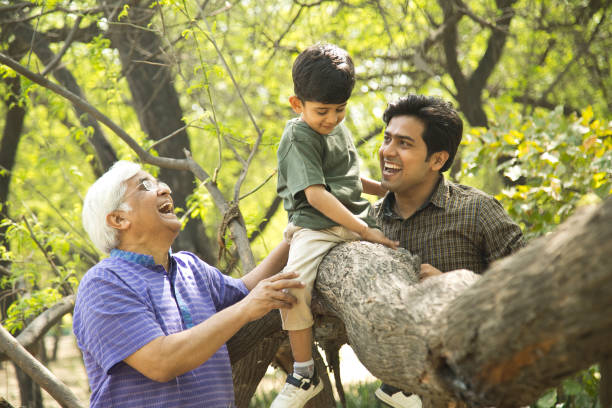 istock Three generation family having fun at park 1386926260