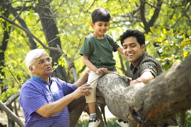 istock Three generation family having fun at park 1386926283