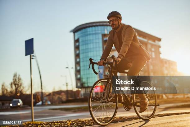 Young Stylish Businessman Going To Work By Bike Stock Photo - Download Image Now - Cycling, Bicycle, Commuter