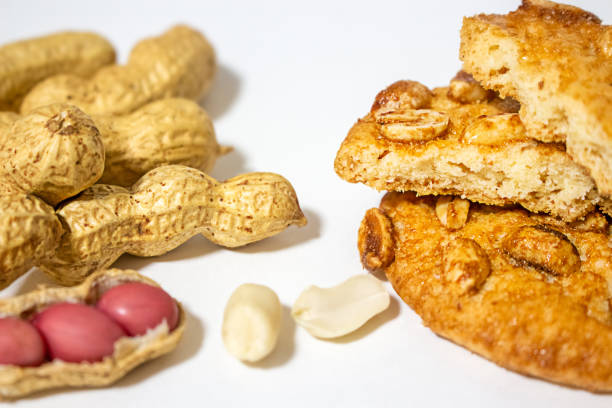 Cookies and peanuts on a white background