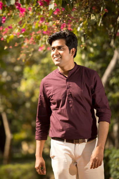 istock Happy man walking at park 1386931917