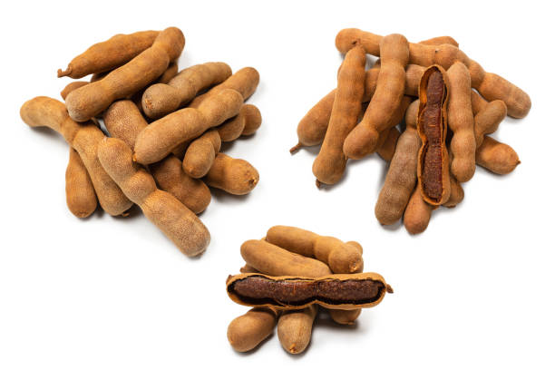istock Sweet tamarind isolated on white background. 1386939218