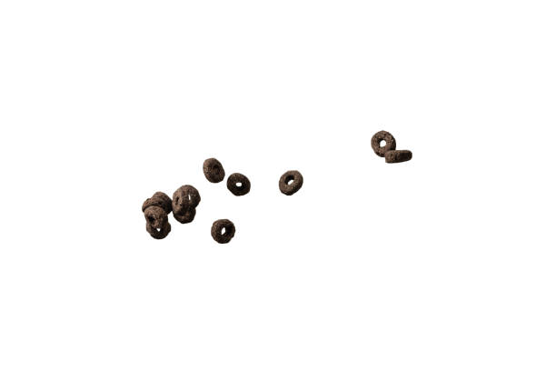 istock Chocolate rings cereal spill out into a bowl. Breakfast. 1386939262