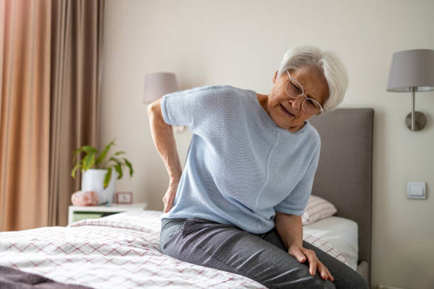 Senior woman suffering from back pain
