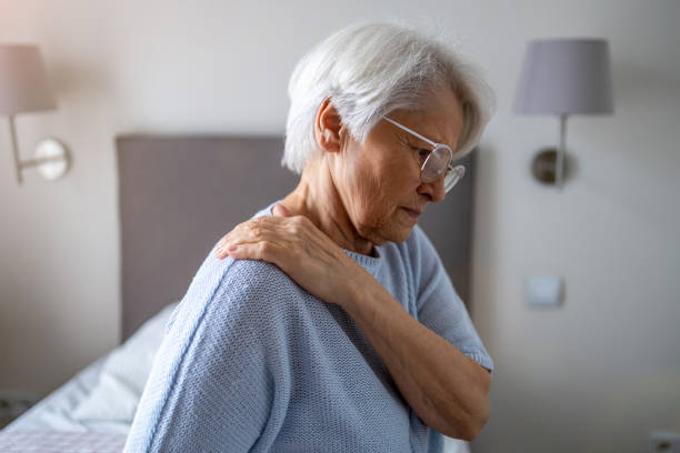 istock Senior woman suffering from back pain 1386939345