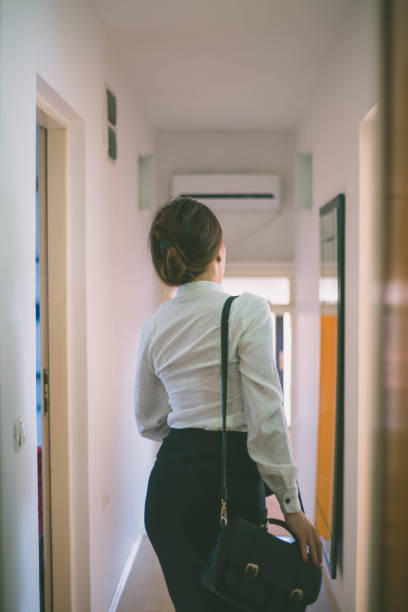 istock Businesswoman getting ready for work 1386939624
