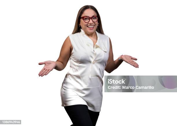 Latin Woman With Glasses Posing In A Very Surprised Pose Stock Photo - Download Image Now