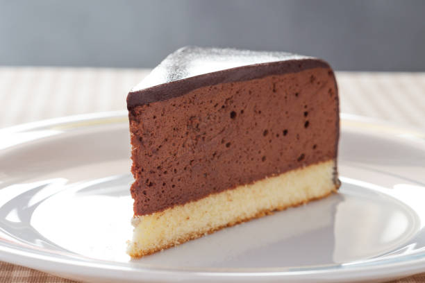 istock Slice of homemade mousse cake with mirror chocolate coverage 1386945372
