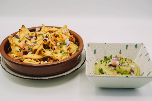istock A portion of nachos with cheese and guacamole 1386949326