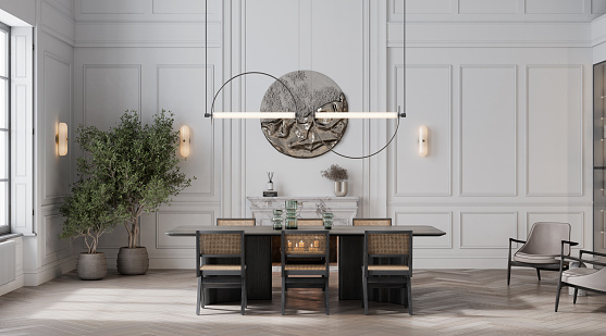 Digitally generated image of black wooden dining table and chairs with overhanging lights and two houseplant in the corning. Dininig area in a luxuriuos apartment in 3d render.