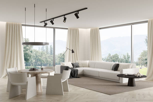 istock Living room interior with white couch and seats, panoramic window 1386953634