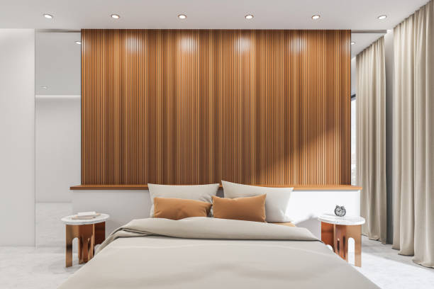 istock Bright bedroom interior with bed, panoramic window with curtain 1386954677