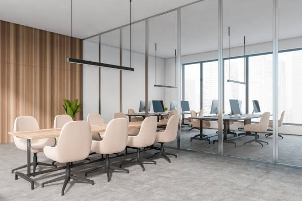 istock Corner view on bright office room interior with meeting board 1386954779