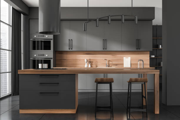 istock Black kitchen set interior with countertop and seats, kitchenware and window 1386954980