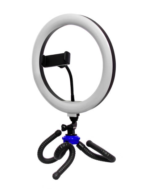 istock tripod with a lamp for a selfie, on a white background in isolation 1386960284
