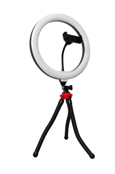 istock tripod with a lamp for a selfie, on a white background in isolation 1386960293